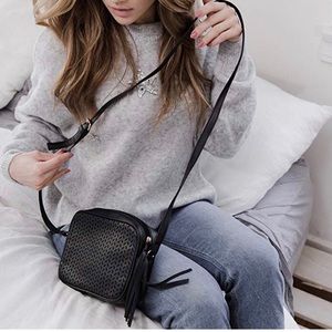 SOLD Crossbody purse with gold a tassel detail